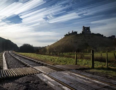 Unique time lapse stack landscape of medieval castle and railway tracks Stock Photos