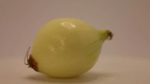 Unique transformation of an ordinary onion captured in stunning detail and artis Stock Footage 328633558