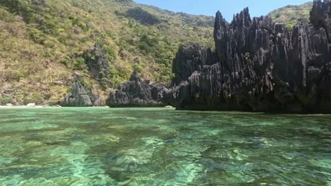 Unique Tropical Bay with Sharp Cliffs at Midday on a Philippine Island Stock Footage 339979516