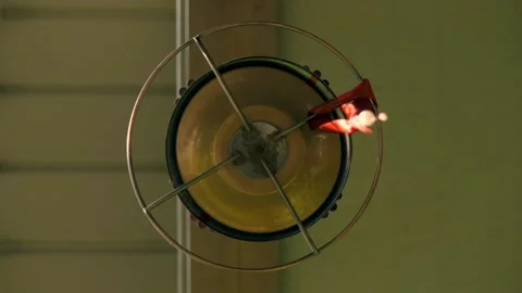 Unique underneath view of a hummingbird hovering and drinking from a feeder. Stock Footage 136479636