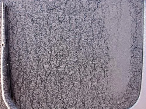 Unique Veined Texture: Close-Up of Gray Surface with Fine Crack Lines background Stock Photos