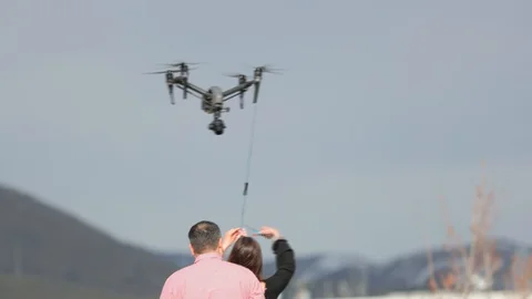 Unique wedding proposal by man filmed using a drone holding the ring Video stock 105483466