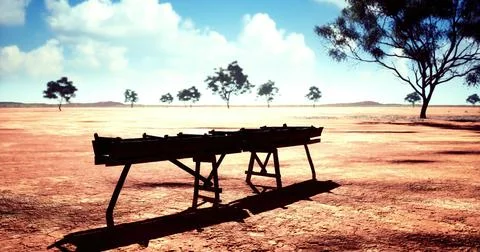 Unique wooden structure stands alone in arid landscape under blue sky Stock Illustration