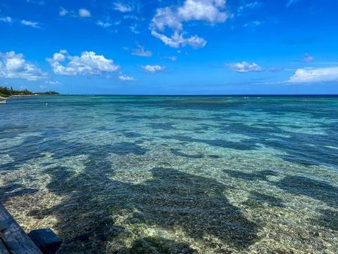 The uniquely patterned reef off of the north side of Cayman Islands on a be.. Stock Photos
