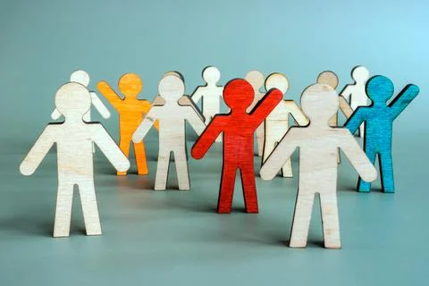 Uniqueness and difference for talent management. Unique figurines in the crowd. Stock Photos