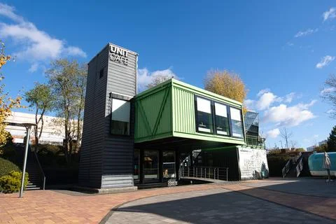 Unit Cafe, built of 14 used sea containers Stock Photos