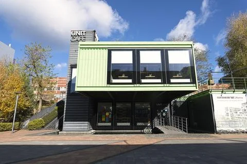 Unit Cafe, built of 14 used sea containers Stock Photos
