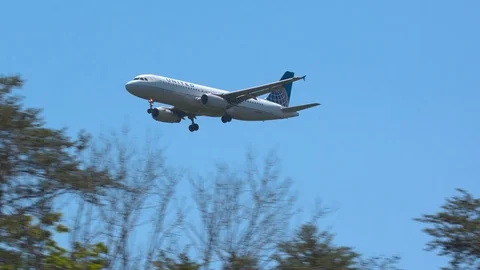 United Airlines A320 Final Approach into Washington DC Dulles Airport Stock Footage 77582020