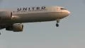 United Airlines landing at sunrise HD Footage