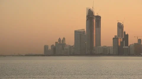 United Arab Emirates, Abu Dhabi, City Skyline at dawn Stock Footage 10743765