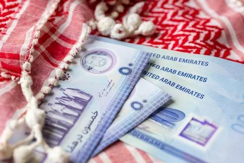 United Arab Emirates dirham banknotes AED spread on traditional arabian  Stock Photos