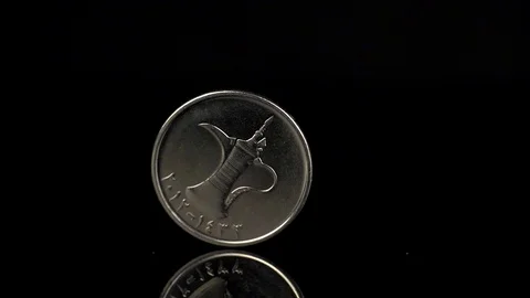 United Arab Emirates dirham spining over black background. Slow motion shot. Stock-Footage 86010353