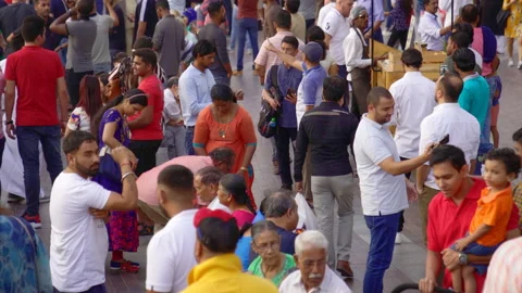United Arab Emirates, Dubai. Movement of people near entrance of Dubai Mall Stock Footage 135771953
