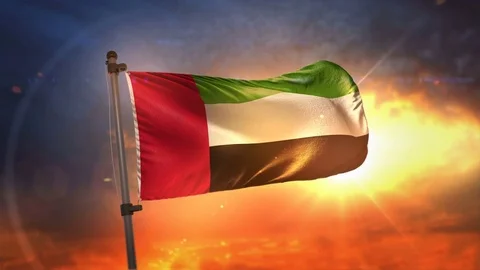 United Arab Emirates Flag Backlit At Beautiful Sunrise Loop Slow Motion 4K Stock Footage 76899669