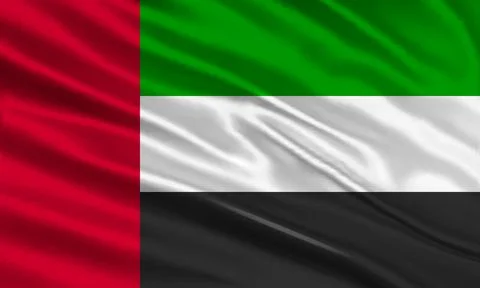United Arab Emirates flag design. Waving UAE flag made of satin or silk Stock Illustration