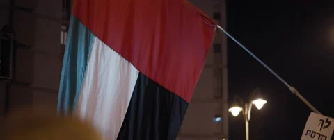 United Arab Emirates Flag during riots Stock Footage 152840850
