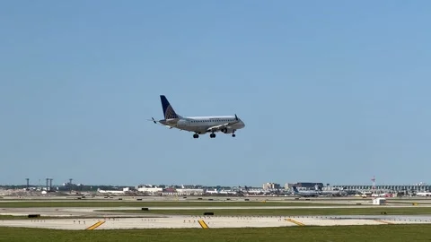 United Express Plane Landing Stock Footage 247328526