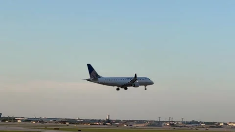 United Express Plane Landing Stock Footage 247328661