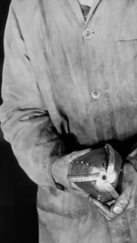 UNITED KINGDOM - 1917 - A shell is bored and cut at a defense plant. Stock Footage 340327211
