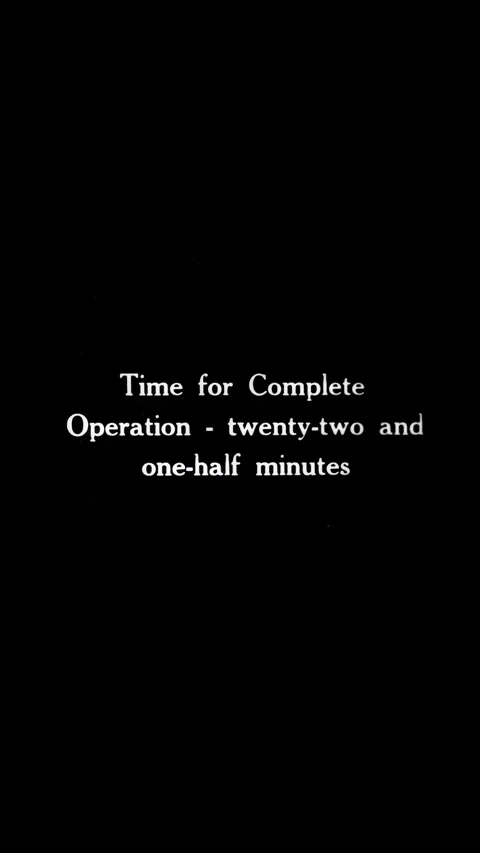 UNITED KINGDOM - 1917 - A shell is placed in a special chuck at a defense plant. Stock Footage 340327226