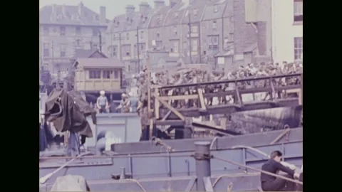 UNITED KINGDOM - 1944: sailors work aboard a moored landing craft Video stock 340234953