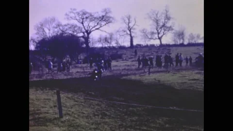 United Kingdom 1962, Motorcyclists on bumpy road in a competition Video stock 207085616
