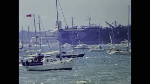 United Kingdom 1994, Warship between many boats in sea scene in 90s. D- day.. Video stock 224600524