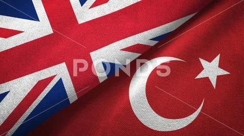 United Kingdom and Turkey two flags textile cloth, fabric texture Stock Photos
