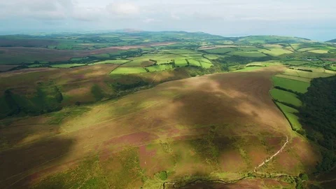 United Kingdom, Devon, Exmoor National Park, slow aerial pan over the moorland Stock Footage 80640224