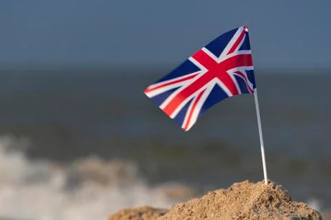 United kingdom flag on the beach. UK flag. Britain Stock Photos