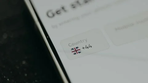 United Kingdom telephone country code and flag Stock Footage 330256280