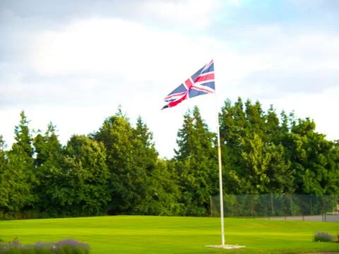 The United Kingdom, Union Jack Flag flying on a flagpole Stock Photos