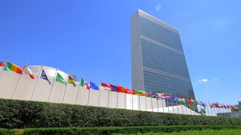 United Nations building headquarters New York City members countries flags NYC Stock Footage