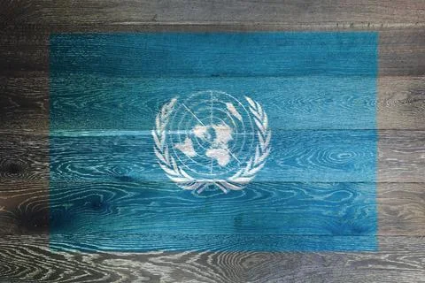 United Nations flag on rustic old wood surface background Stock Illustration