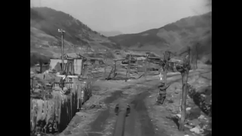 United Nations Forces advance through rough conditions towards the 38th Parallel Stock Footage 82431951