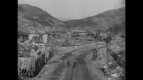 United Nations Forces advance through rough conditions towards the 38th Parallel Stock Footage 146470190