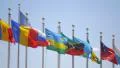 United Nations UN members flags waving sunny windy day blue sky NYC 4k or 4k+ Resolution