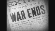 United States: 1910S: Newspaper Headline As War Ends. Soldiers In Street Stock Footage