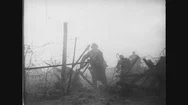 United States: 1910S: Soldiers Run Through Fence. Soldiers Run Into Trench. Gun Stock Footage