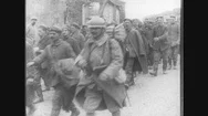 United States: 1910S: Soldiers Walk Along Road. Soldiers Stand Behind Fence Stock Footage