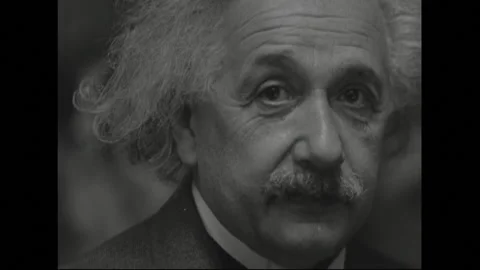 UNITED STATES 1930s: Albert Einstein talking to man. Close up of Einstein. Model Stock Footage 301944959