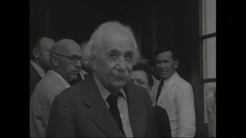 UNITED STATES 1930s: Albert Einstein posing in doorway. Model of medical Stock Footage 301944964