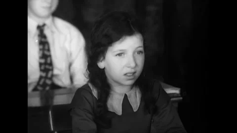UNITED STATES - 1936 - Anxious elementary school students recite the Stock Footage 341971223