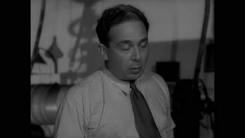 United States 1940s: Physicist Leo Szilard stands in a laboratory setting Stock Footage 158967228