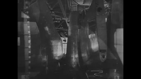 UNITED STATES - 1941: Worker tools metal aircraft part 스톡 동영상 342856998