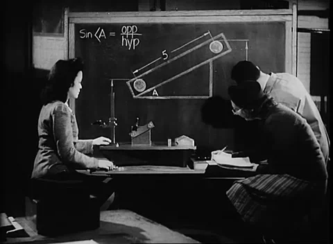 UNITED STATES - 1943: Technical math training - Triangle formula guides lesson Stock Footage 344508837