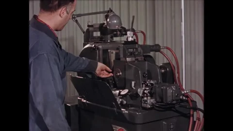 UNITED STATES - 1950s - The engineer inspects a machine washing tools and a Stock Footage 340654006