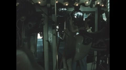 UNITED STATES 1950s: Man pulls a lever, and pulls a string on a bell. The Video stock 309541134