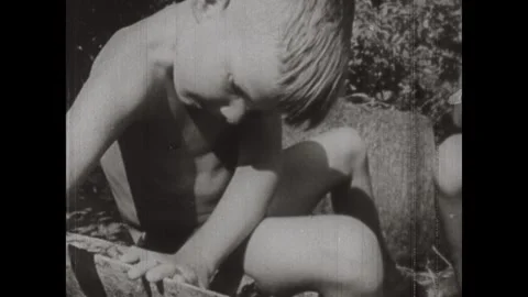 UNITED STATES 1950s: Text on a gray background states, "NORMALLY EACH CHILD Stock Footage 337200671