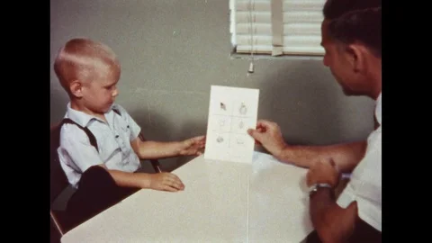 UNITED STATES 1950s: Using the Garcelle Word Recognition Test with a Young Boy Stock Footage 74965962